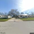 Belligerent man walking dog off leash in Bolivar