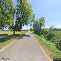 Person's hand trapped under tractor in McCrory