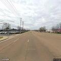 Man lying on sidewalk at Germantown Road and Stage Hills
