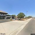 Person experiencing abdominal pain near North 91st Avenue