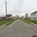 Man throws burning coals on couple in alley