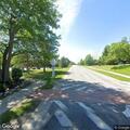 Female lying injured on Pine Line Road grass