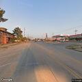 Traffic stop on gray Nissan Versa in Pine Ridge