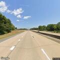 Vehicle disabled after hitting tire on highway