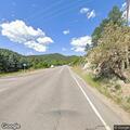 Minor crash between car and deer on Highway 74