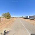 Suspicious men hiding bicycle near Calle del Norte