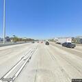 Naked person and small fire on I-10 Holt ramp