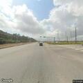 Single-car crash with airbags deployed at highway intersection