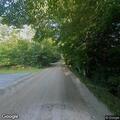 Deceased deer blocking roadway on Madison Road