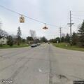 Person arrested on warrant at road intersection