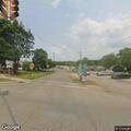 Traffic stop of red car with no visible plate