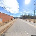Traffic stop on white three-axle truck