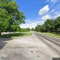 Grass or campfire reported along FM 197 roadway