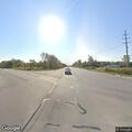 Traffic stop on black Cadillac at 26 Mile Road