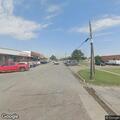 Car rolls down hill into ditch near church