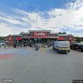 Officer escorting woman to gas station