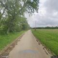 Vehicle crash knocks down smoking power pole