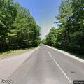 Brush blocking roadway on County Highway H