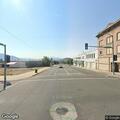 Young female walking erratically on street in Butte