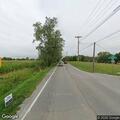Pedestrian walking in roadway on 96th Street