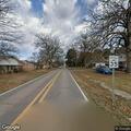 Woman knocking on doors on Greenwood Avenue