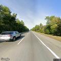 Car leaves I-195 ramp and burns in nearby woods
