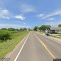 Officer checks Chevy Suburban on Highway 11