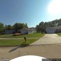 Speeding pickup blaring horn through neighborhood