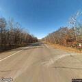 Large debris blocking County Road 1