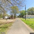 Traffic stop on black sedan at Vivian Housing complex