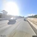 Pedestrians walking on I-10 shoulder near Garfield