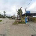 Suspicious camper parked at car wash property