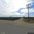 Power pole transformers on fire near Porterville plant