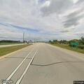 Pickup truck loses trash can on Highway 50