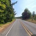 Erratic gold SUV driving on US-101 near Quilcene