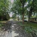 Loose dog following pedestrian on Hoover Avenue