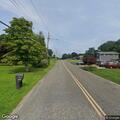 Tree knocks down wires and pole, causes power outage