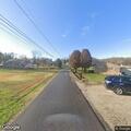 Fallen tree blocking lane on East Meadow Road
