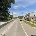 Woman walking with bags says trying to reach Indiana