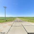 Wind driven field fire near 539th Avenue