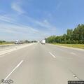 Vehicle hits deer on interstate shoulder
