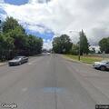 Intoxicated person walking in roadway with guitar
