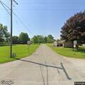 Traffic stop on silver Cadillac with temporary tag