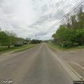 Officer stops gray pickup on West Mill Street
