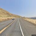 Semi trailer doors open on State Route 14