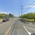 Disabled car with hazard lights on at Montauk Highway