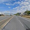 Broken hydrant floods Route 101A with water and sand