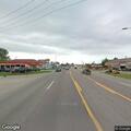 Officer conducts traffic stop on black Buick