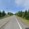 Officer checks white Chevy Tahoe near Thorndike