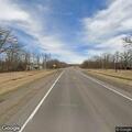 Truck dropping crop debris on Highway 10
